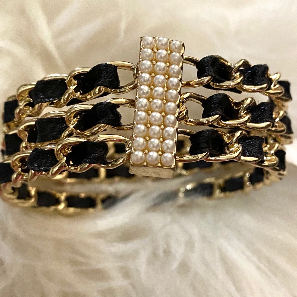 Black and gold bracelet.